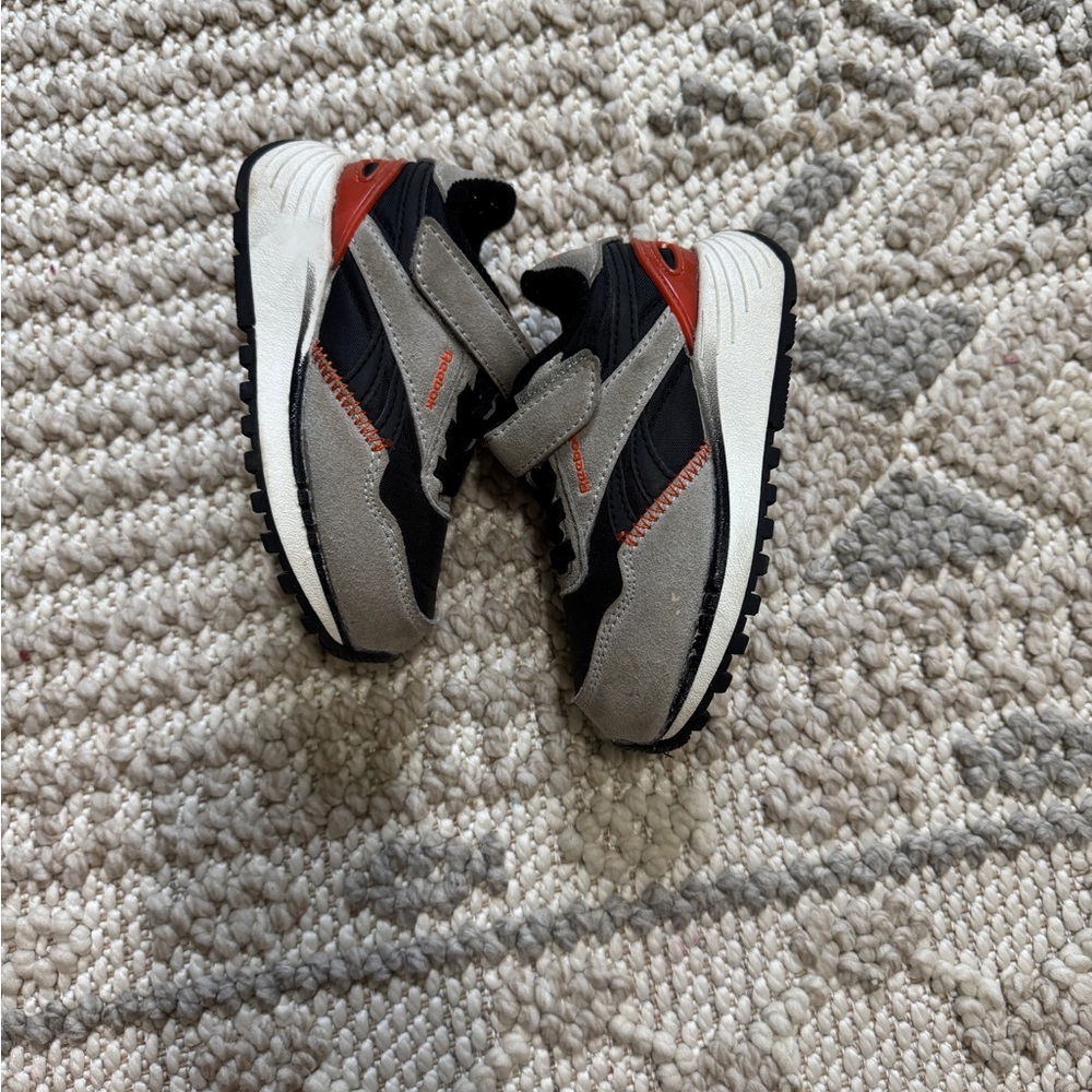 Stylish Black and Red Sneakers Reebok